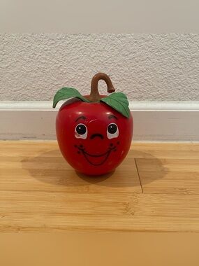 Vintage Fisher-Price Happy Apple (Model 435), a classic roly-poly musical chime